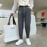 Aidase New Fashion Spring Summer Pants Men Tapered Bottom Slit Trousers Korean Style White Khaki Black Elastic Waist Casual Pants Man aidase-shop