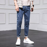 Jeans Men's Pants Men Spring and Autumn Korean version of the trend of the hole Slim nine pants bunch of feet pants men's foot pants aidase-shop